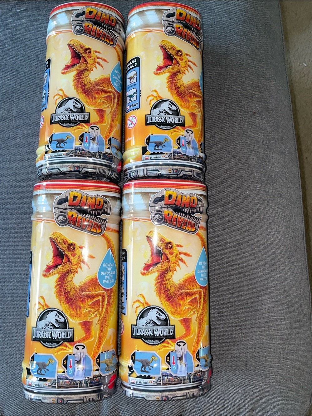 Mattel Jurassic World Dino Reveal Canisters - Yellow & Orange